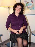 Horny mature slut getting naked and frisky