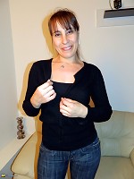 Naughty mom playing on the couch with her pussy
